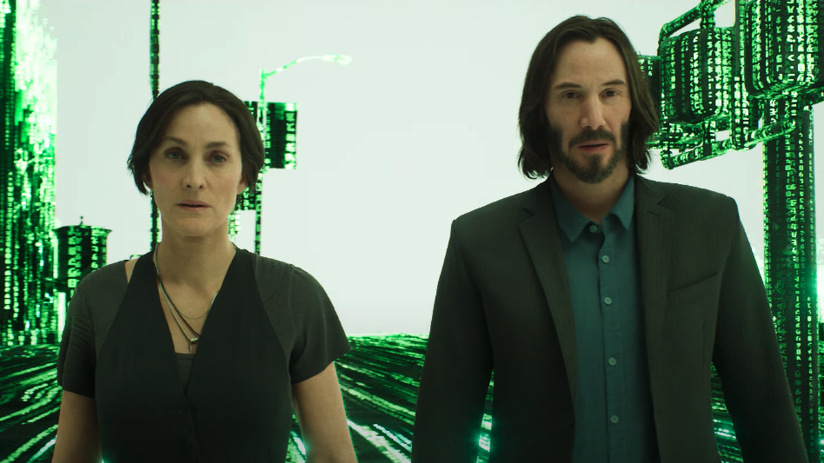 Synthetic versions, i.e. deepfakes of Carrie-Ann Moss and Keanu Reeves in a still from Matrix Awakens